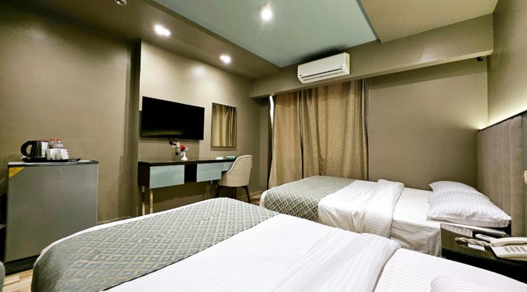 Grand Bayan Hotel & Apt At Nile Plaza Kairo Zimmer foto