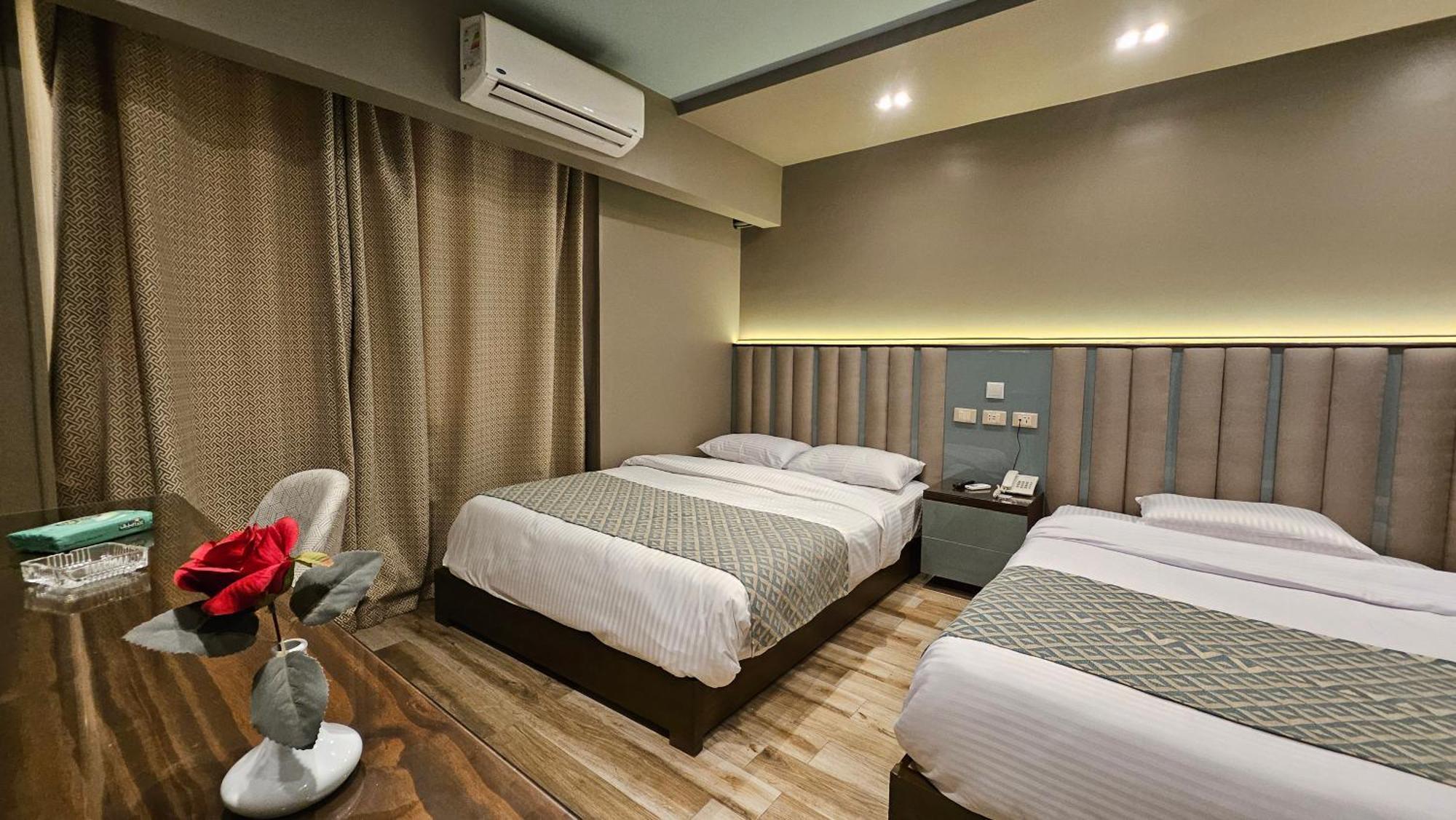 Grand Bayan Hotel & Apt At Nile Plaza Kairo Zimmer foto